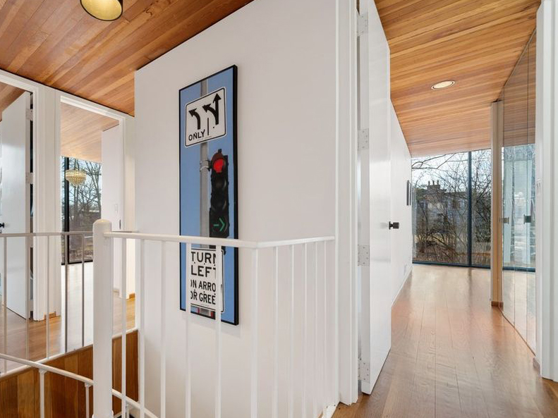 Glass house Illinois upstairs staircase wooden white