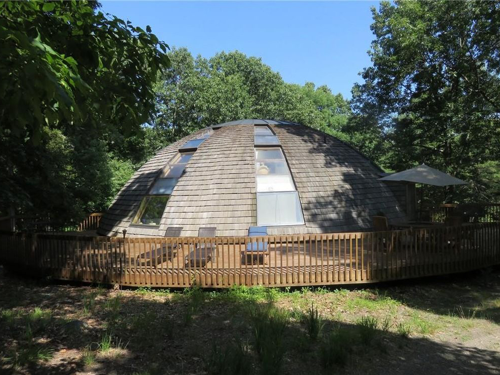 Dome house exterior deck with sun lounges