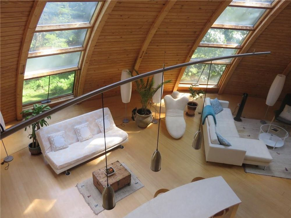 New York dome house wood walls living room