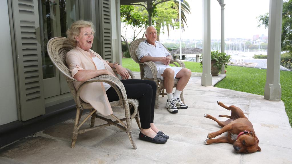 Photograph couple outside $27m house