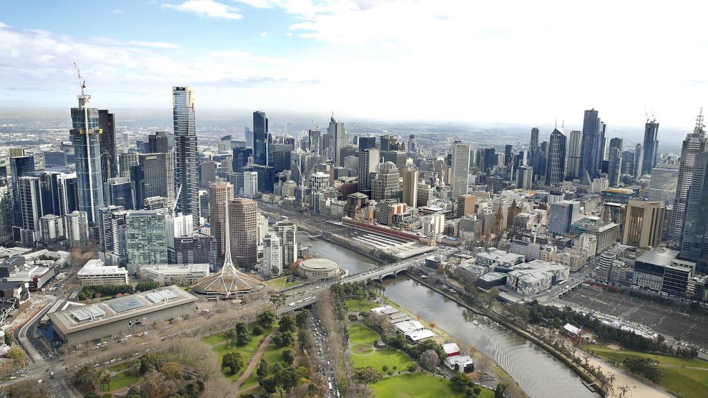 Helicopter view of Melbourne's cranes/skyline