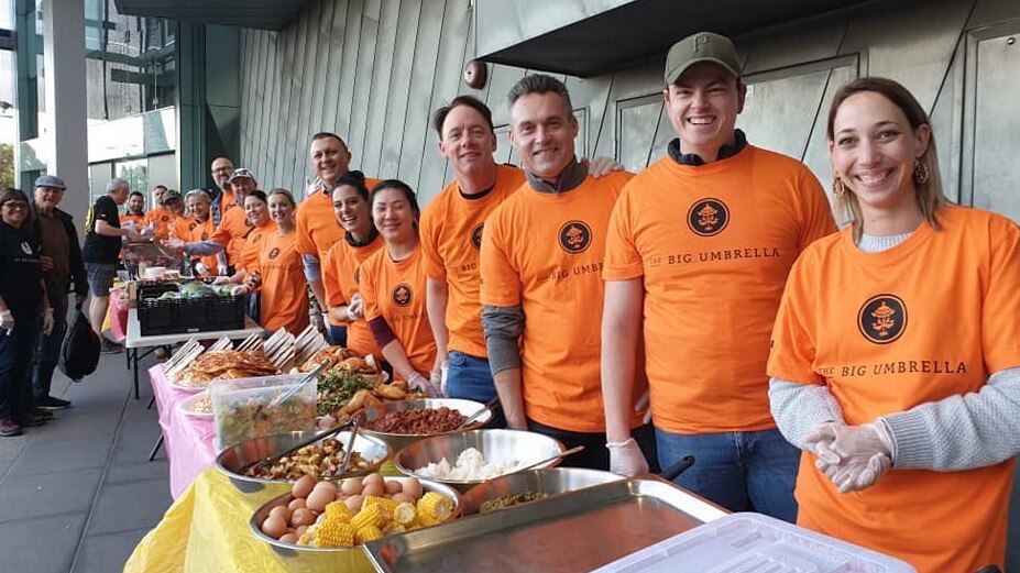 Noel Jones directors and staff helping Big Umbrella Foundation feed Melbourne's homeless earlier this year - for herald sun real estate