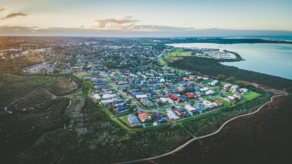 Aerial panoramic view of Hastings suburb and Westernport Marina at dusk. Melbourne, Australia