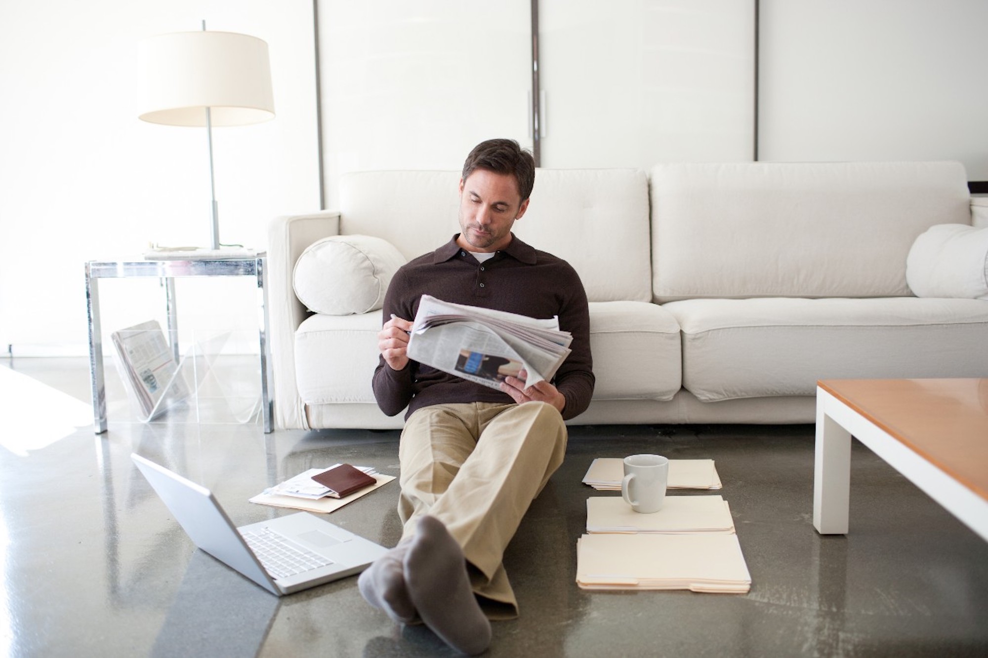 man reading paper